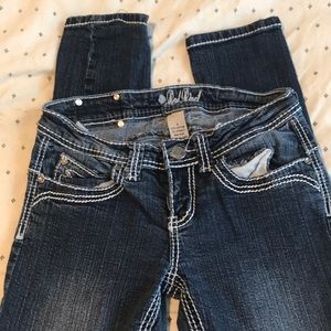 Red Rivet Skinny Jeans